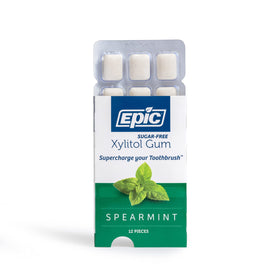 Hands selecting Epic gum from a row of packs for quick freshness.