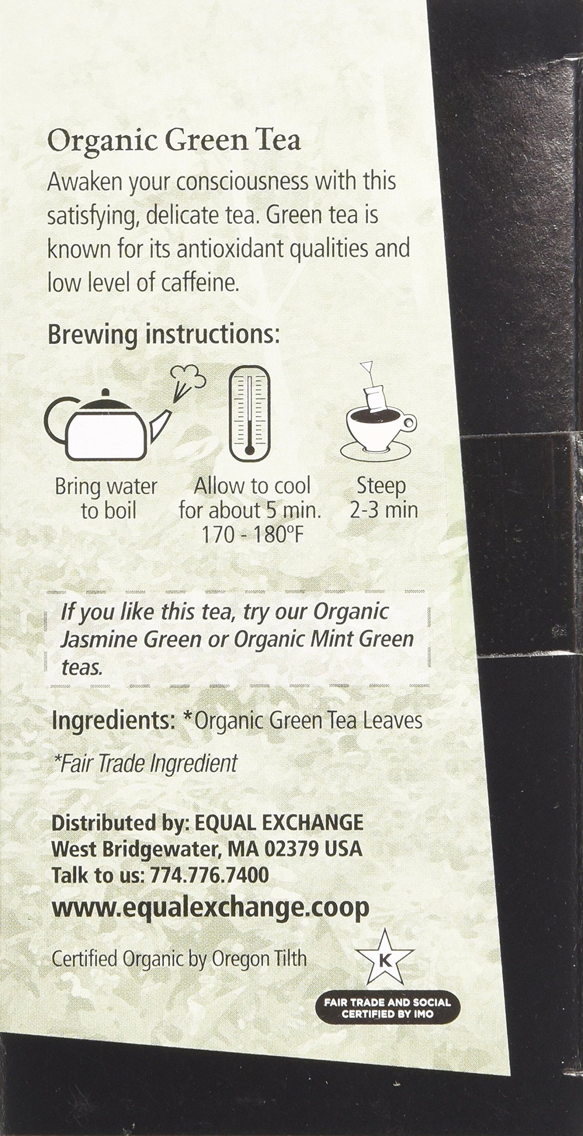 Equal Exchange green tea brew in a cup with ethically sourced greens.