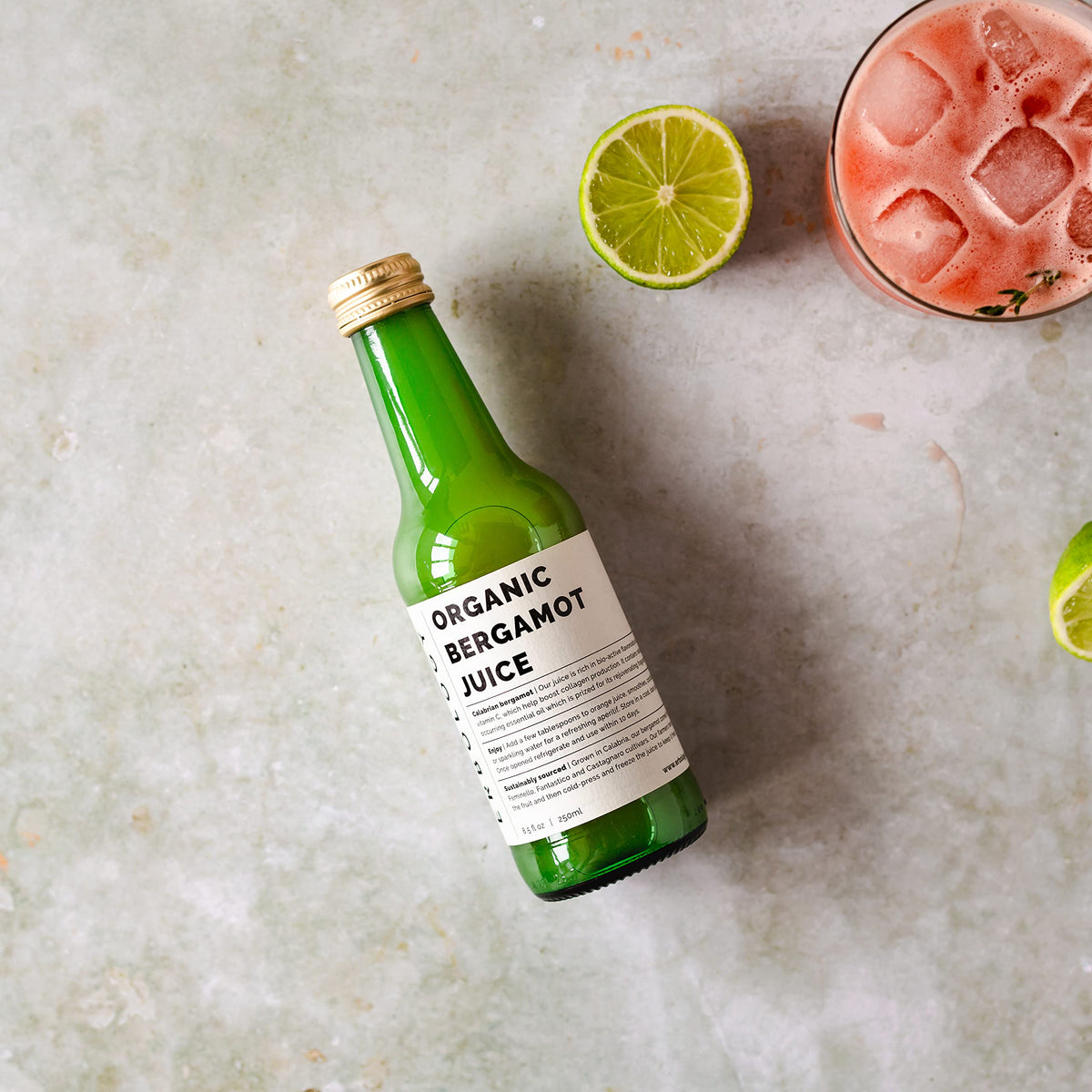Erbology bergamot juice bottle label closeup highlights unsweetened, undiluted quality.