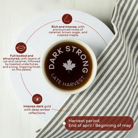 Escuminac dark robust maple syrup pour ideal for desserts and glazes.