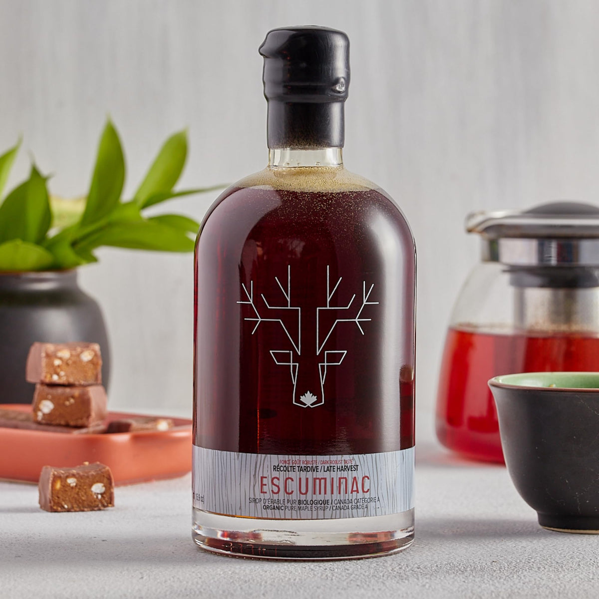 Escuminac organic Grade A maple syrup bottle showcases pure, additive-free maple.