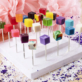Espeez hard candy cube lollipops in packaging for easy gifting and bulk events.