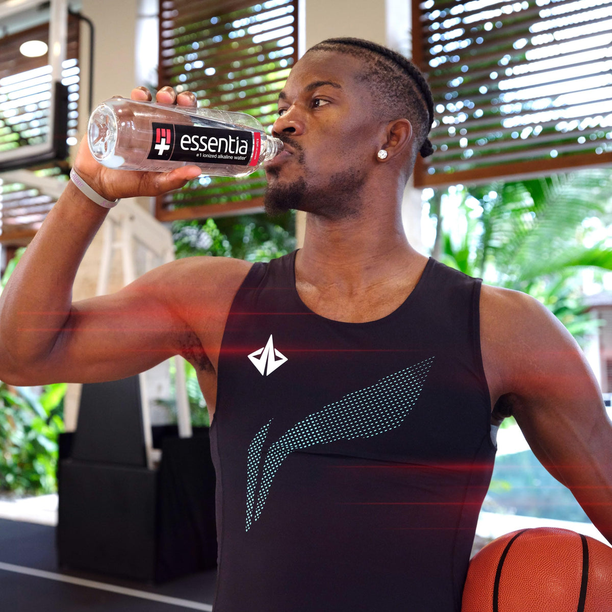 Essentia Water 12-pack case shown for convenient storage at home, office, or car.