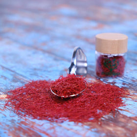Eupherbia red gold spice packaging highlights luxury culinary ingredient.