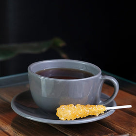 Eupherbia saffron rock candy dissolving in hot tea adds aroma and color.