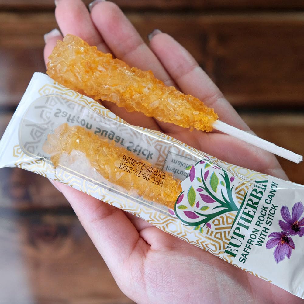 Eupherbia saffron threads beside rock candy emphasize luxury ingredients.
