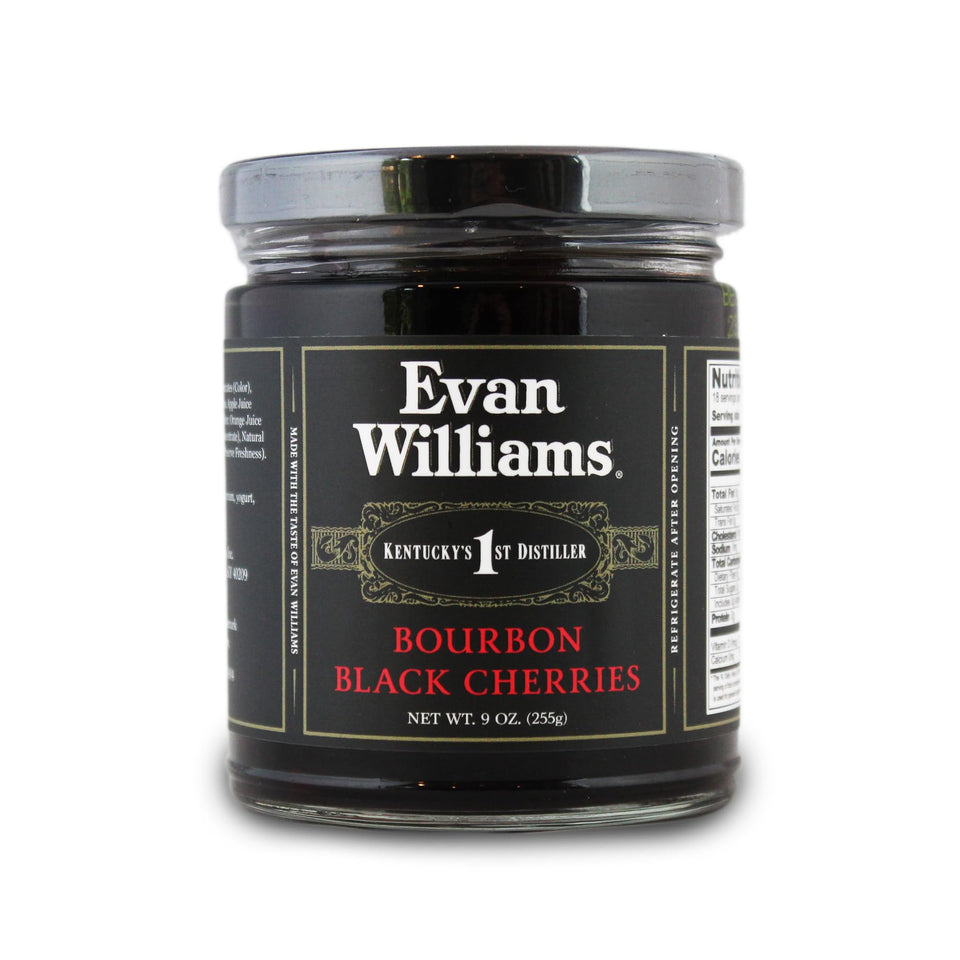 Evan Williams Bourbon Black Cherries in a stemmed jar, ideal for Old Fashioned garnish.