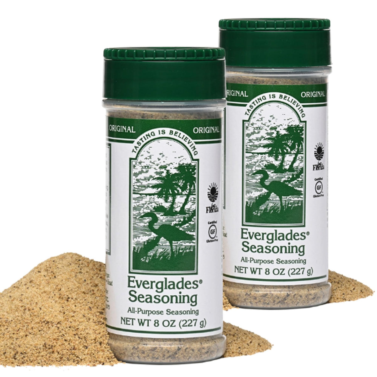Everglades All Purpose Seasoning bottle being shaken to boost flavor on meats and vegetables.