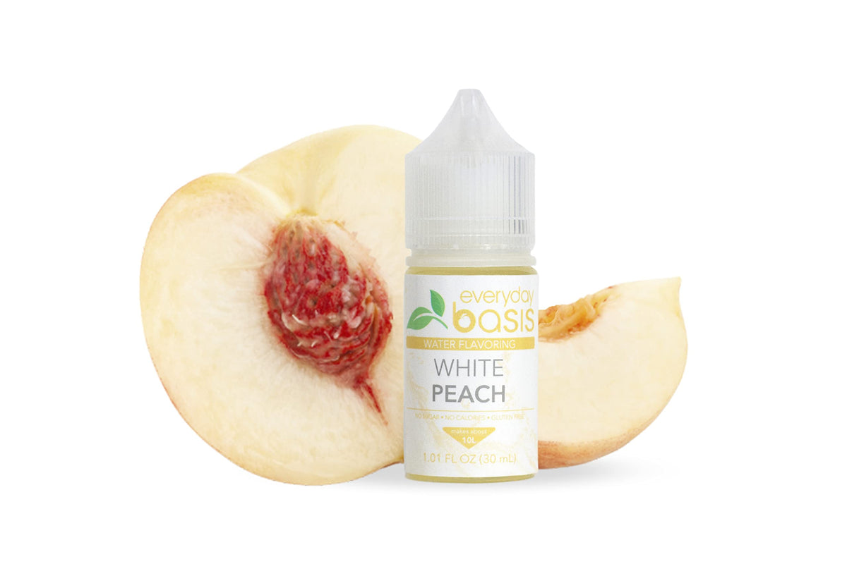 Everyday Basis White Peach flavor being poured into a glass with bright aroma.
