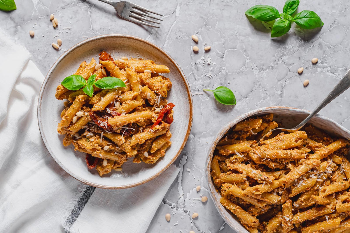 EXPLORE CUISINE Organic Red Lentil Penne bag in pantry, ready-to-use gluten-free base.