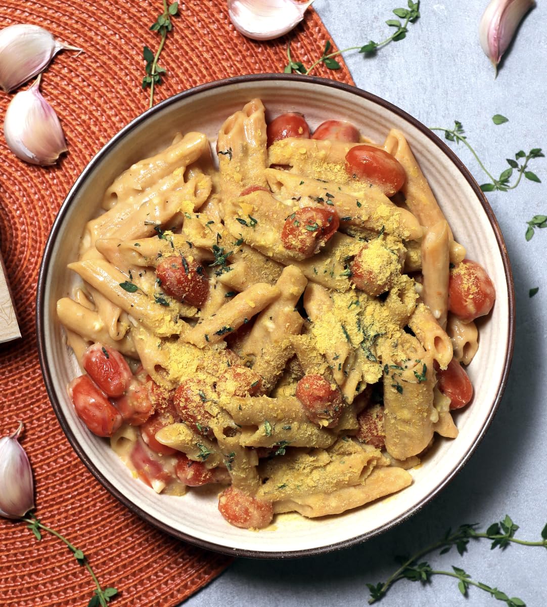 EXPLORE CUISINE Cooked penne twirled on fork, protein and fiber satisfying.