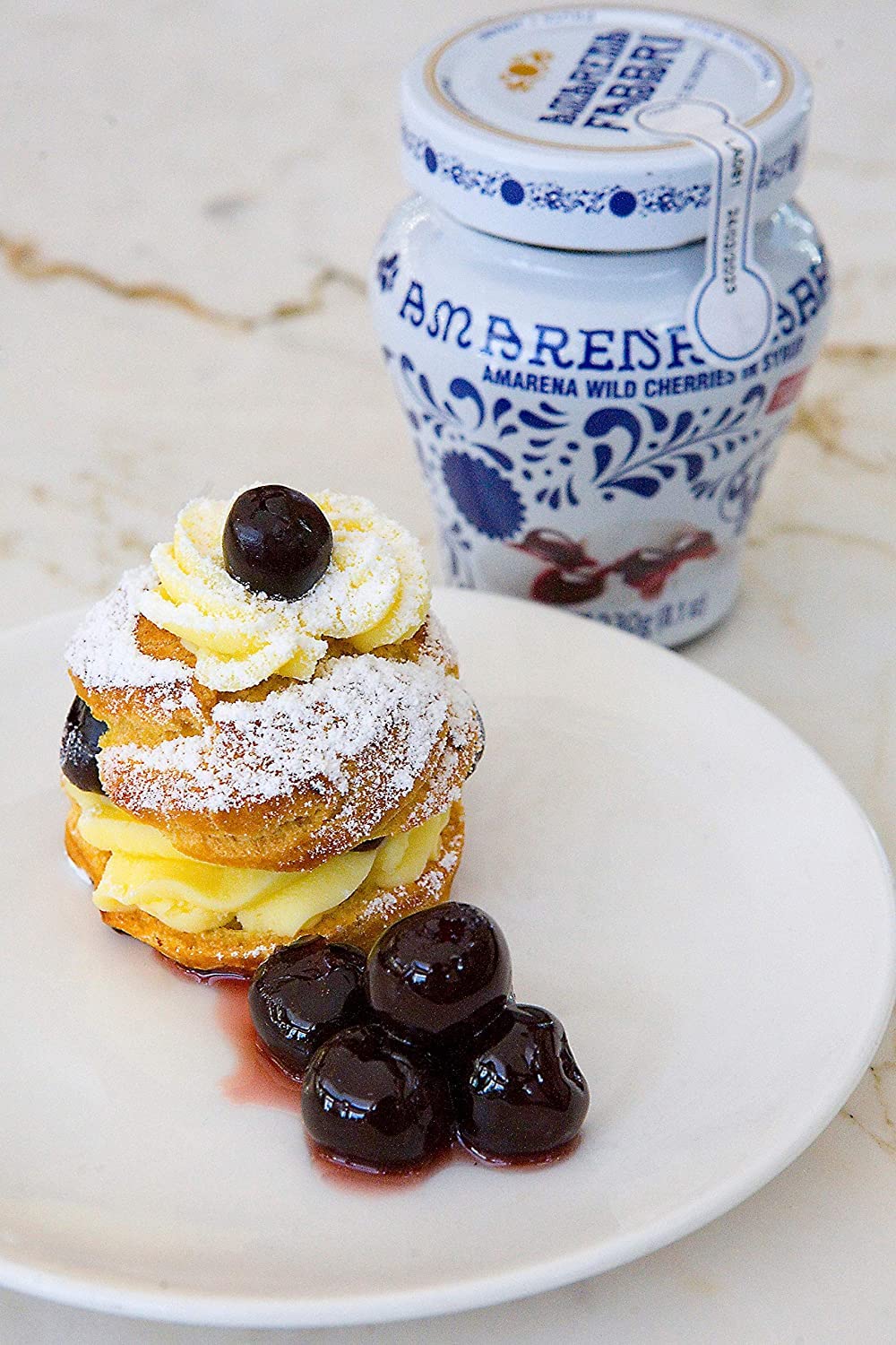Fabbri Amarena cherries in syrup dessert-topping adds color and depth.