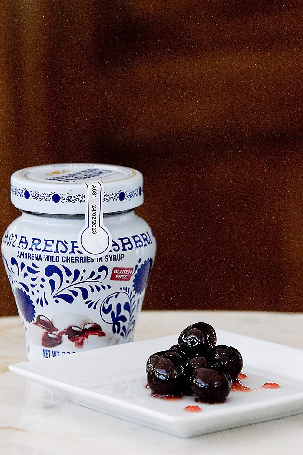 Fabbri Amarena cherries in syrup gelato topping for a refined finish.