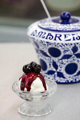 Fabbri Amarena syrup close-up, showcasing glossy glaze and premium fruit.