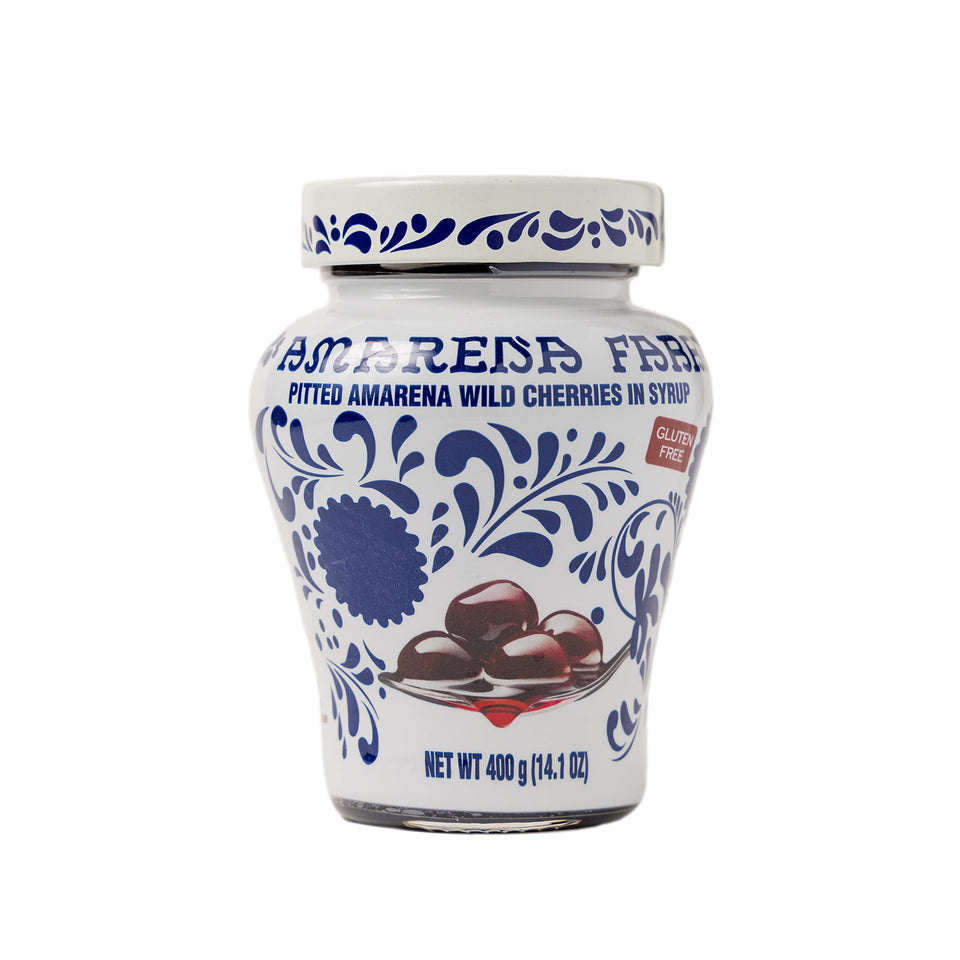 Fabbri Amarena wild cherries in syrup in a jar, perfect dessert topping.