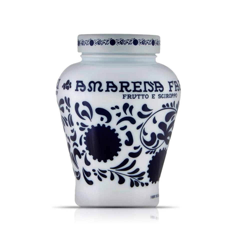 Fabbri Amarena Wild Cherries in Syrup bottle with glossy glaze, ideal dessert topping.