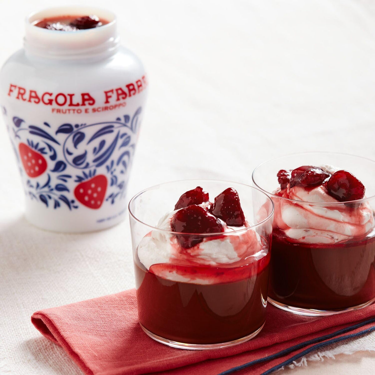 Fabbri Strawberries in Syrup on a dessert plate, great for cakes