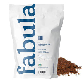 Fabula Dark Roast bag closeup highlighting aroma and shade-grown origin for a balanced cup
