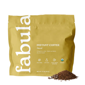 Fabula Organic Instant Decaf Coffee jar shows premium Arabica aroma, low acid, and convenient preparation.
