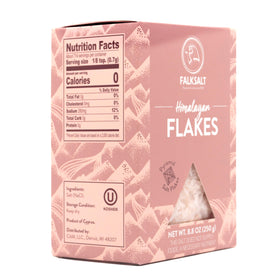 Falksalt Pink Himalayan Salt Flakes on a plate to enhance flavor and texture.