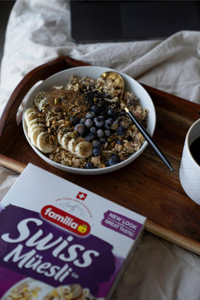 Closeup of Familia Swiss Muesli packaging emphasizing eco-friendly design