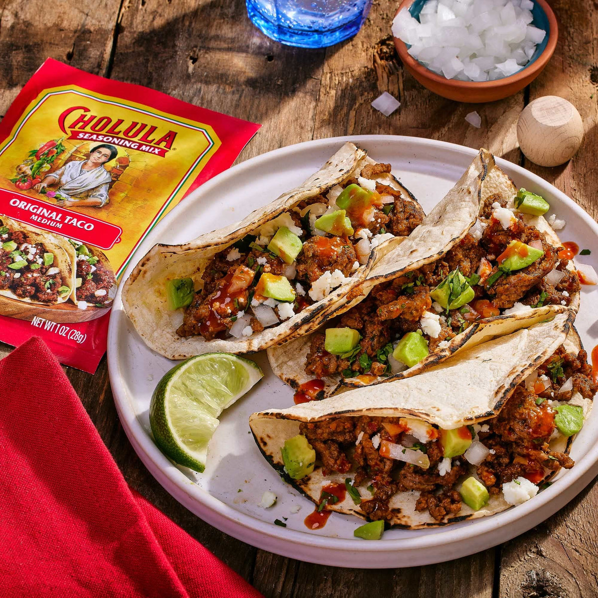Family taco night table featuring Cholula seasoning.