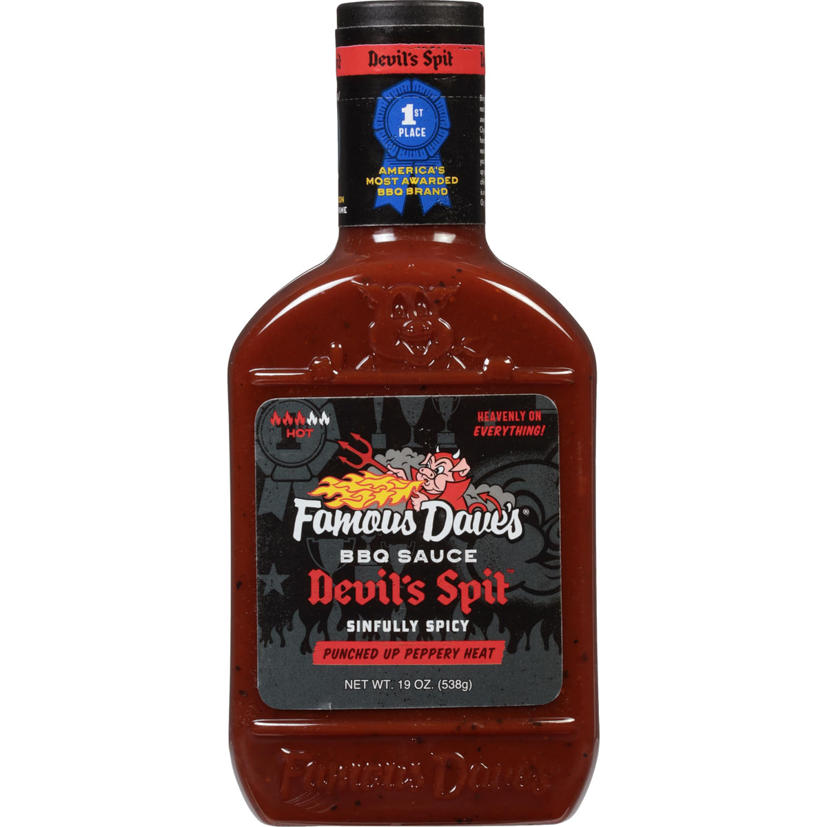 Famous Dave's Rich & Sassy bottle pouring glaze for juicy ribs.