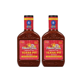 Famous Dave's Texas Pit BBQ Sauce 2-pack bottles glaze ribs with bold flavor.
