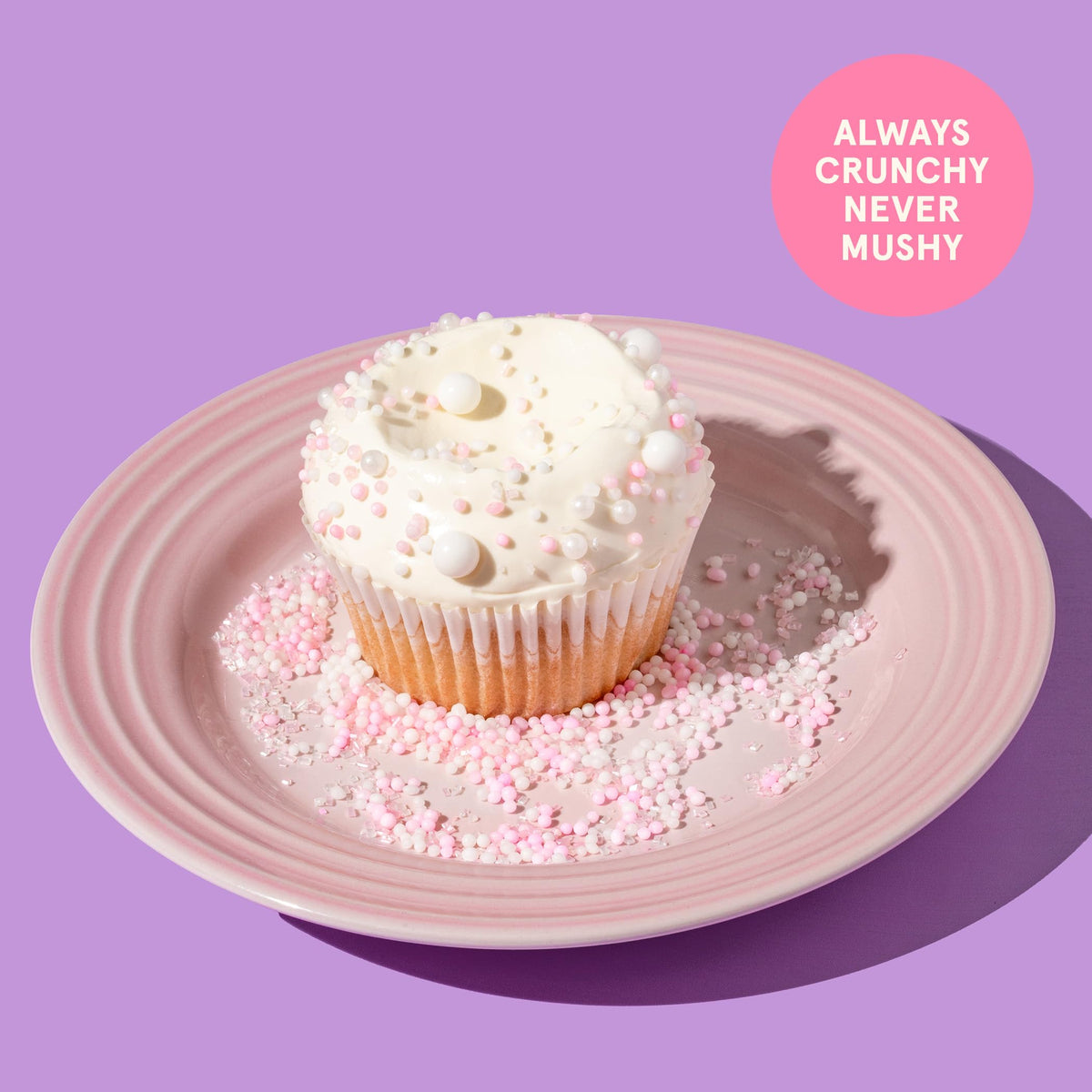 Fancy Sprinkles pink and white pearls decorate cupcakes with a playful, celebratory look.