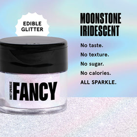 Fancy Sprinkles Moonstone glitter being dispensed to dust into a drink for shimmer