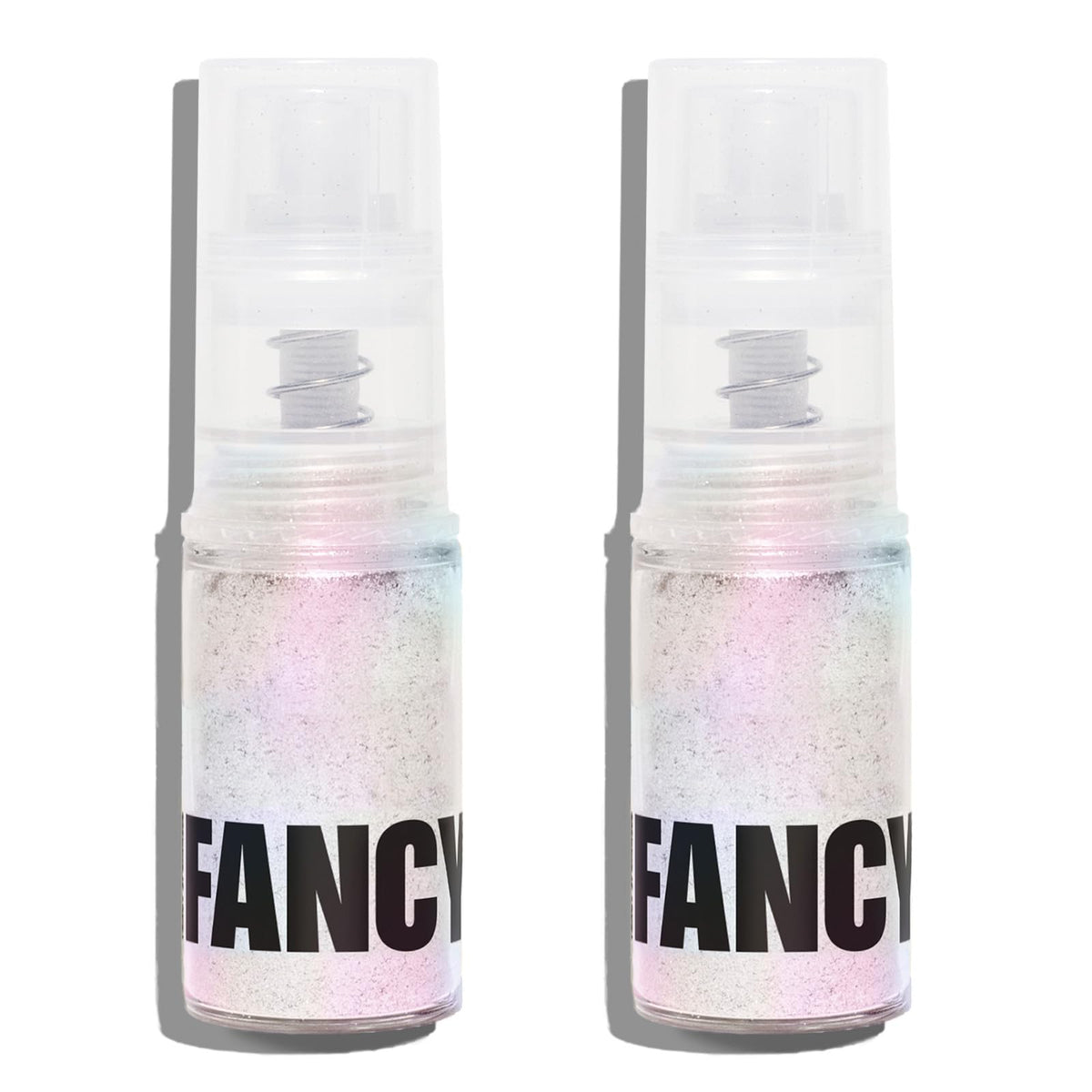 Moonstone glitter spray bottle applying iridescent sparkle to a cake with no added texture