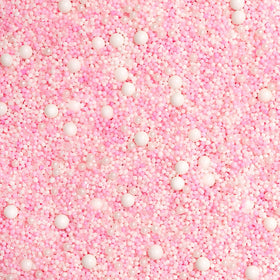 Fancy Sprinkles pastel pink and white nonpareils provide festive detail for desserts.