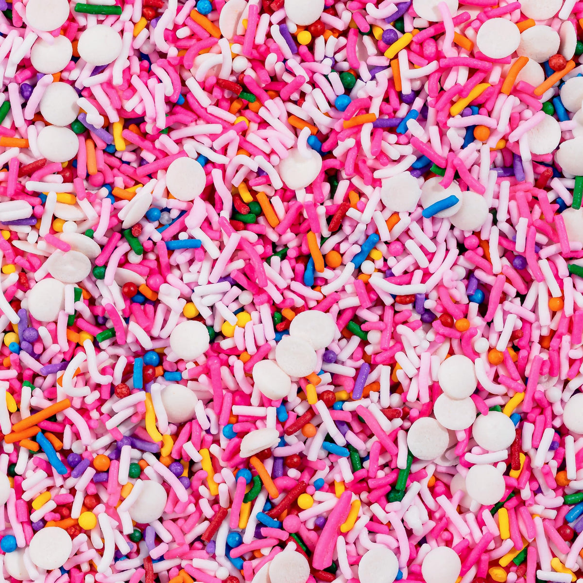 Fancy Sprinkles Pink Pinata Sprinkles decorate cupcakes with playful rainbow accents