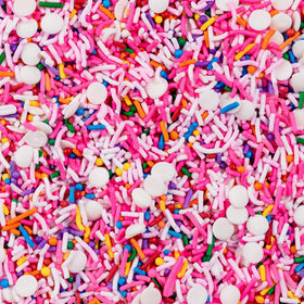Fancy Sprinkles Pink Pinata Sprinkles decorate cupcakes with playful rainbow accents