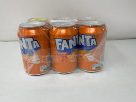 Fanta Orange Soda cans on table invite sharing and celebration.