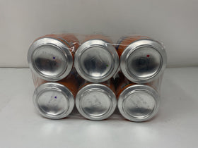 Fanta Orange Soda pours into glass highlighting citrus aroma and bubbles.