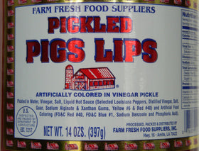 Farm Fresh Food Suppliers Pickled Pigs Lips inside jar, vivid slices in brine ideal for bold tasting moments.