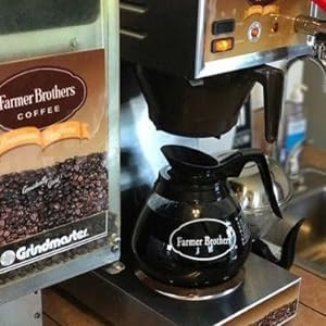 Farmer Brothers coffee cup with steam, inviting morning aroma