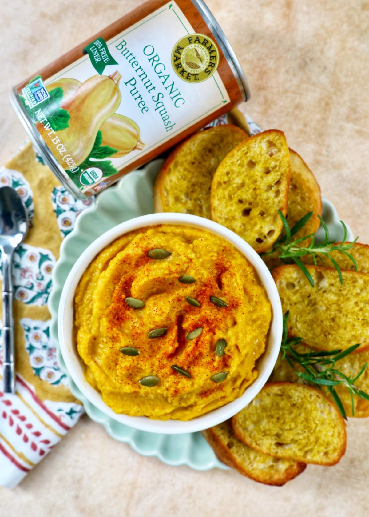 FARMER'S MARKET Organic Butternut Squash Puree 15oz jars stacked, showcasing 12-pack value.