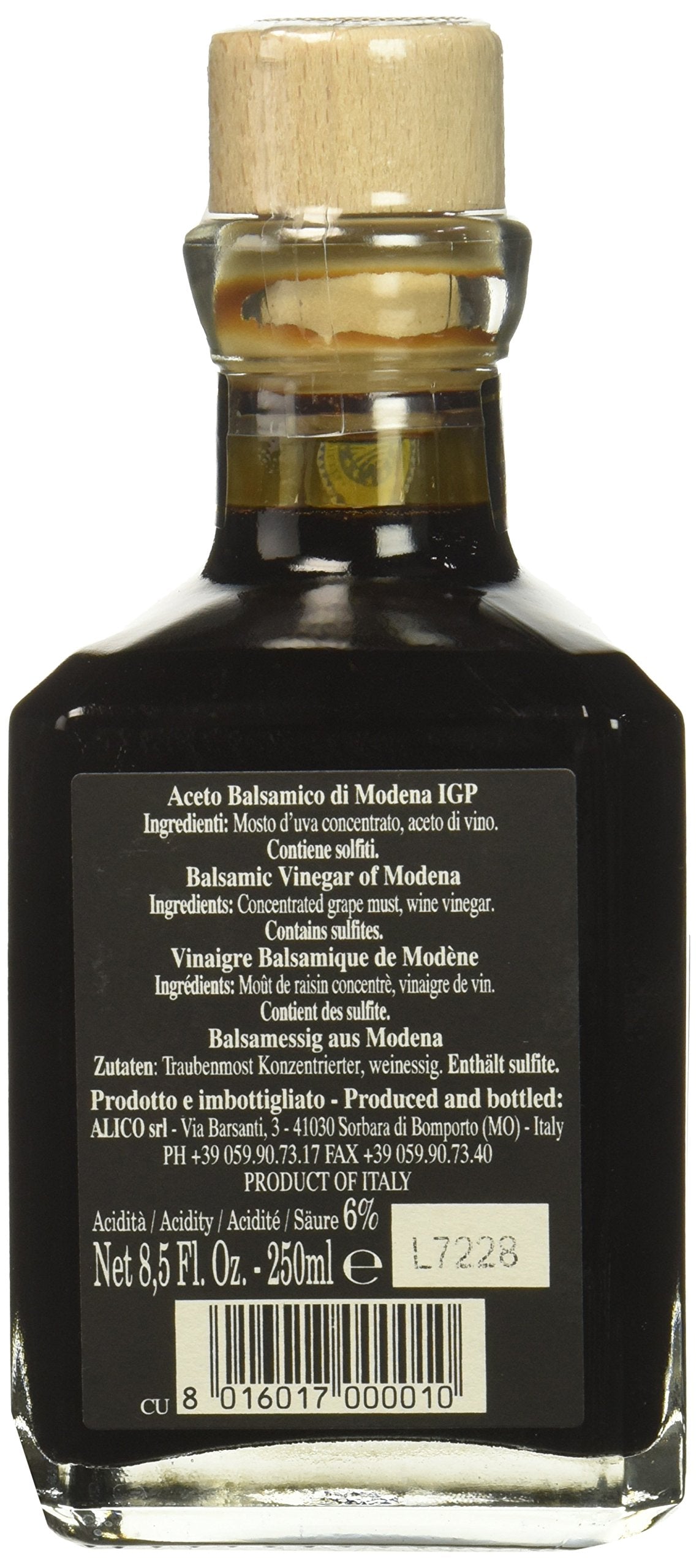 Fattoria Estense Gold Label balsamic being poured as a glaze on food