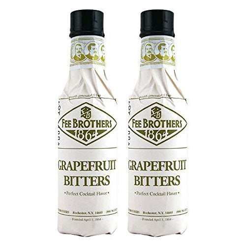 Fee Brothers Grapefruit Bitters bottle close-up highlighting citrus aroma for cocktails.