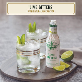 Fee Brothers Lime Bitters bottle closeup highlights vegan-friendly, gluten-free formulation.