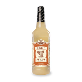 Fee Brothers Orgeat Syrup bottle pour enhances cocktails with balanced almond flavor.