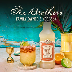 Fee Brothers Orgeat Syrup twist pour captures elegant café-style beverages.