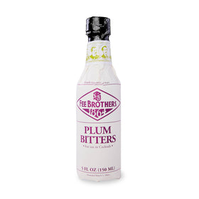 Fee Brothers Plum Bitters bottle pour enhances cocktail depth and aroma