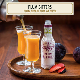 Fee Brothers Plum Bitters in a glass cocktail shows rich color and balanced flavor