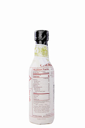 Fee Brothers Cherry Bitters bottle with pour spout highlighting fruit flavor for mixed drinks.