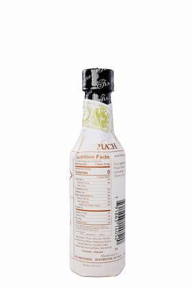 Fee Brothers Peach Cocktail Bitters label close-up highlighting peach aroma and quality.