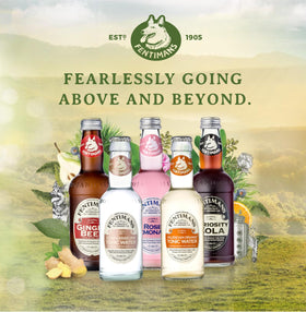 Fentimans Curiosity Cola bubbles closeup emphasizes natural fizz.