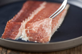 FERMIN Jamon Iberico vacuum-sealed pack preserves freshness for easy snacking.